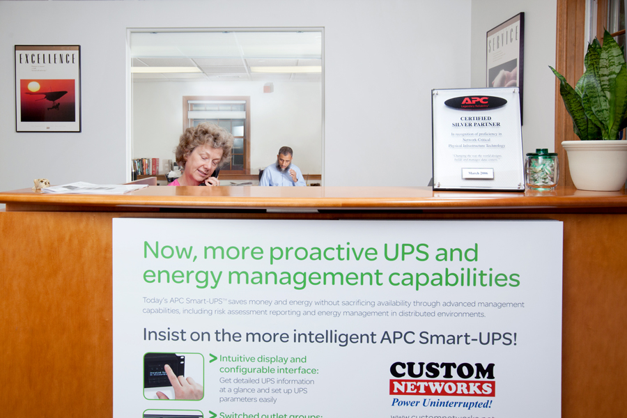 Photo Of Service Desk At APC Company - Custom Networks